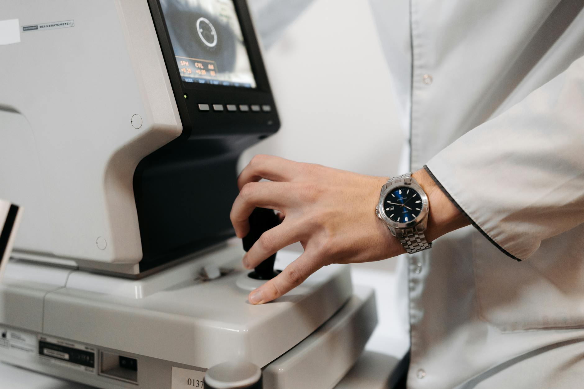 a doctor using a medical device