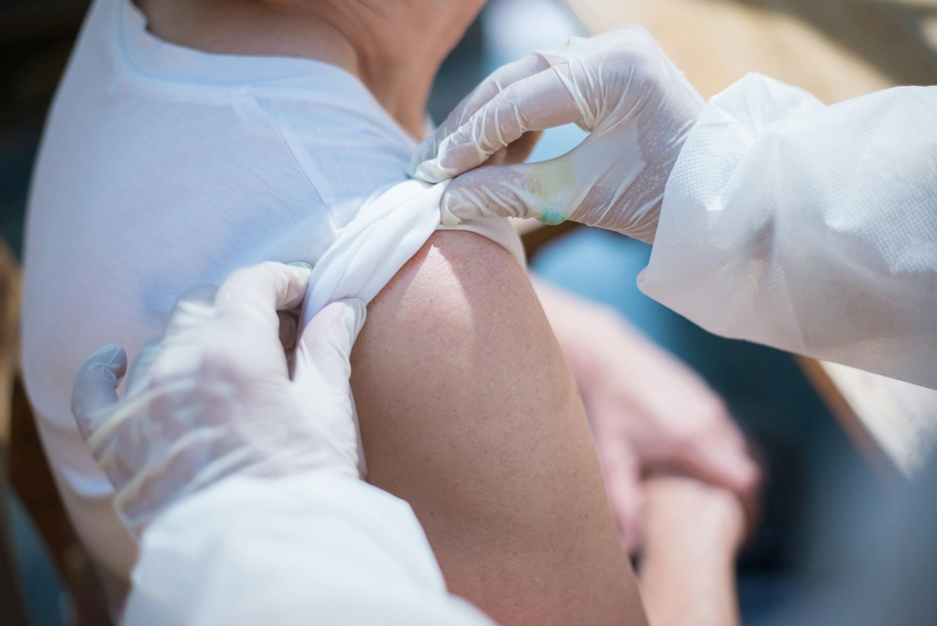 doctor preparing patient to vaccination