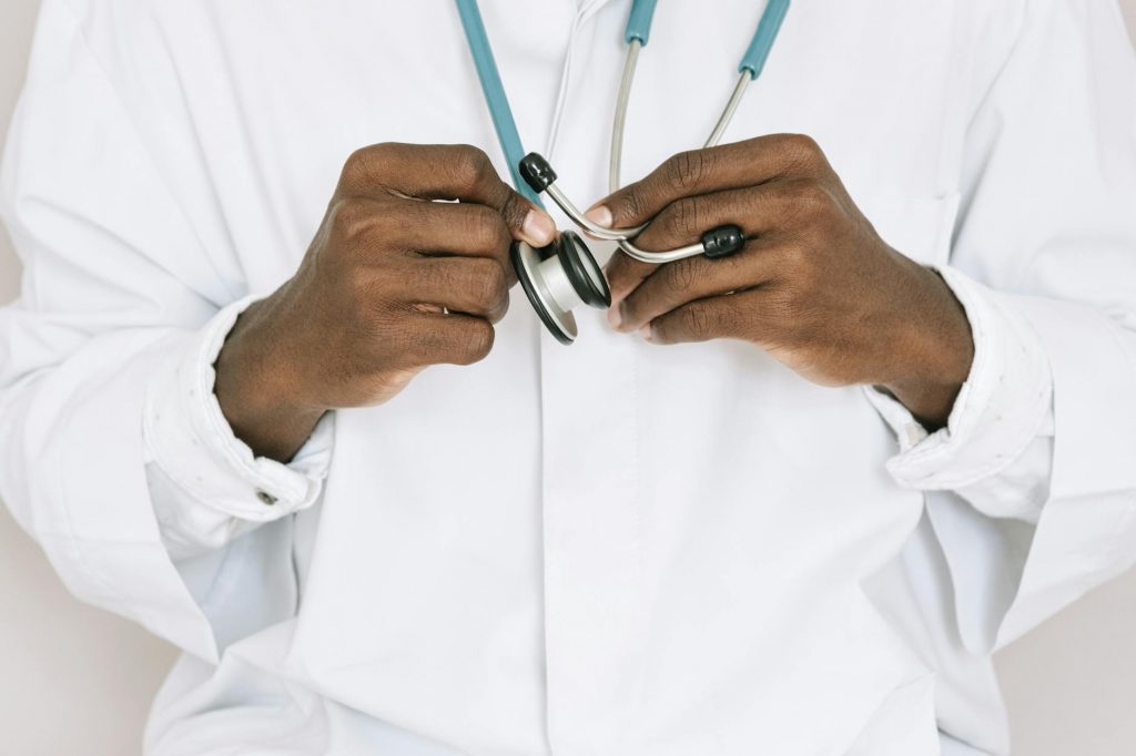 person holding a stethoscope